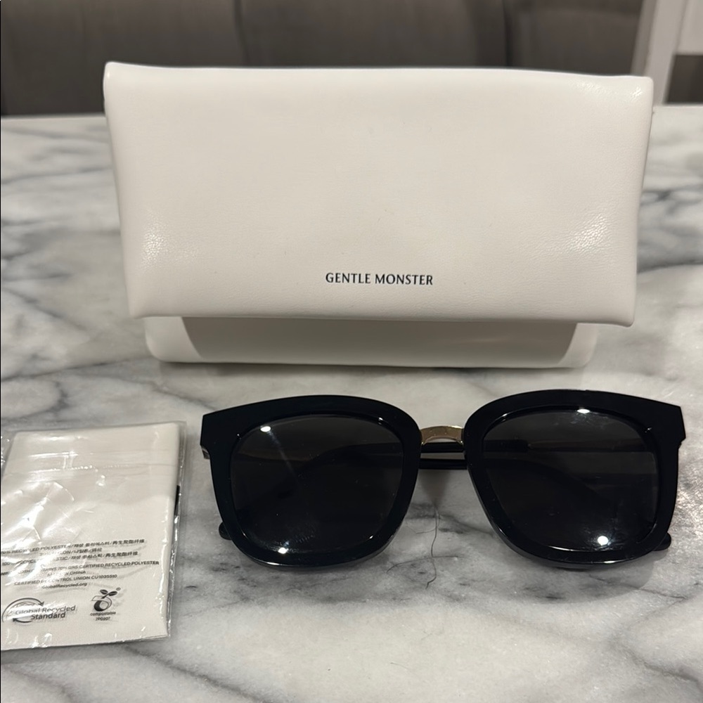 Gentle Monster Black Sunglasses with Gold Accent